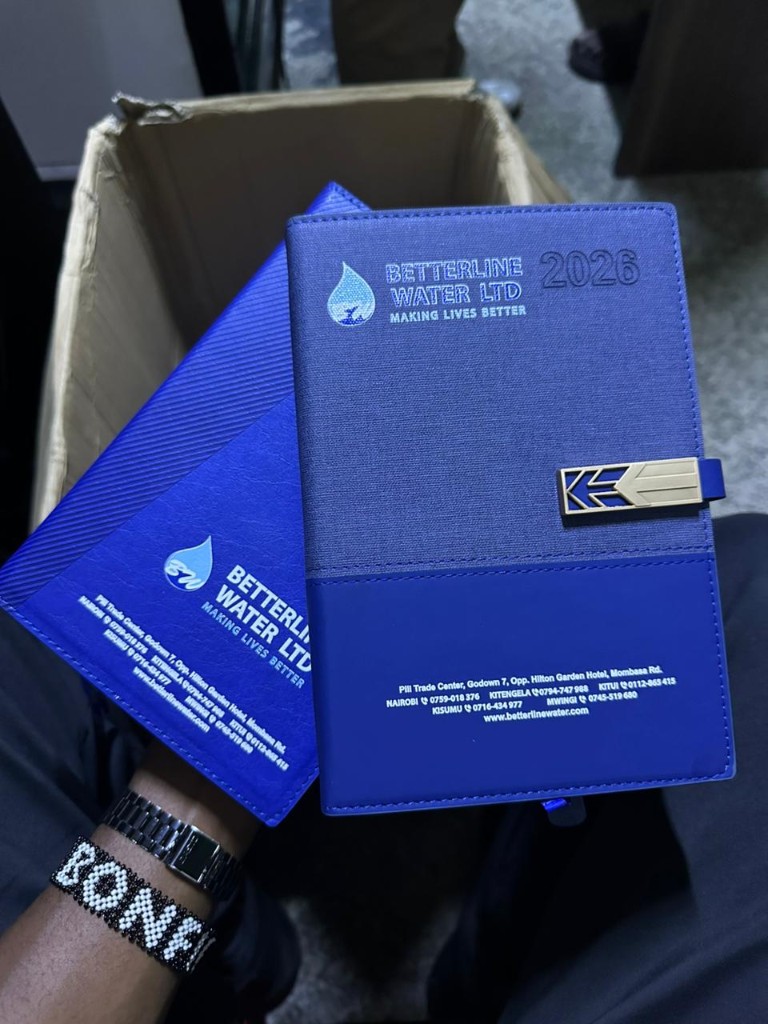 Branded Betterline Water notebooks and organizers.