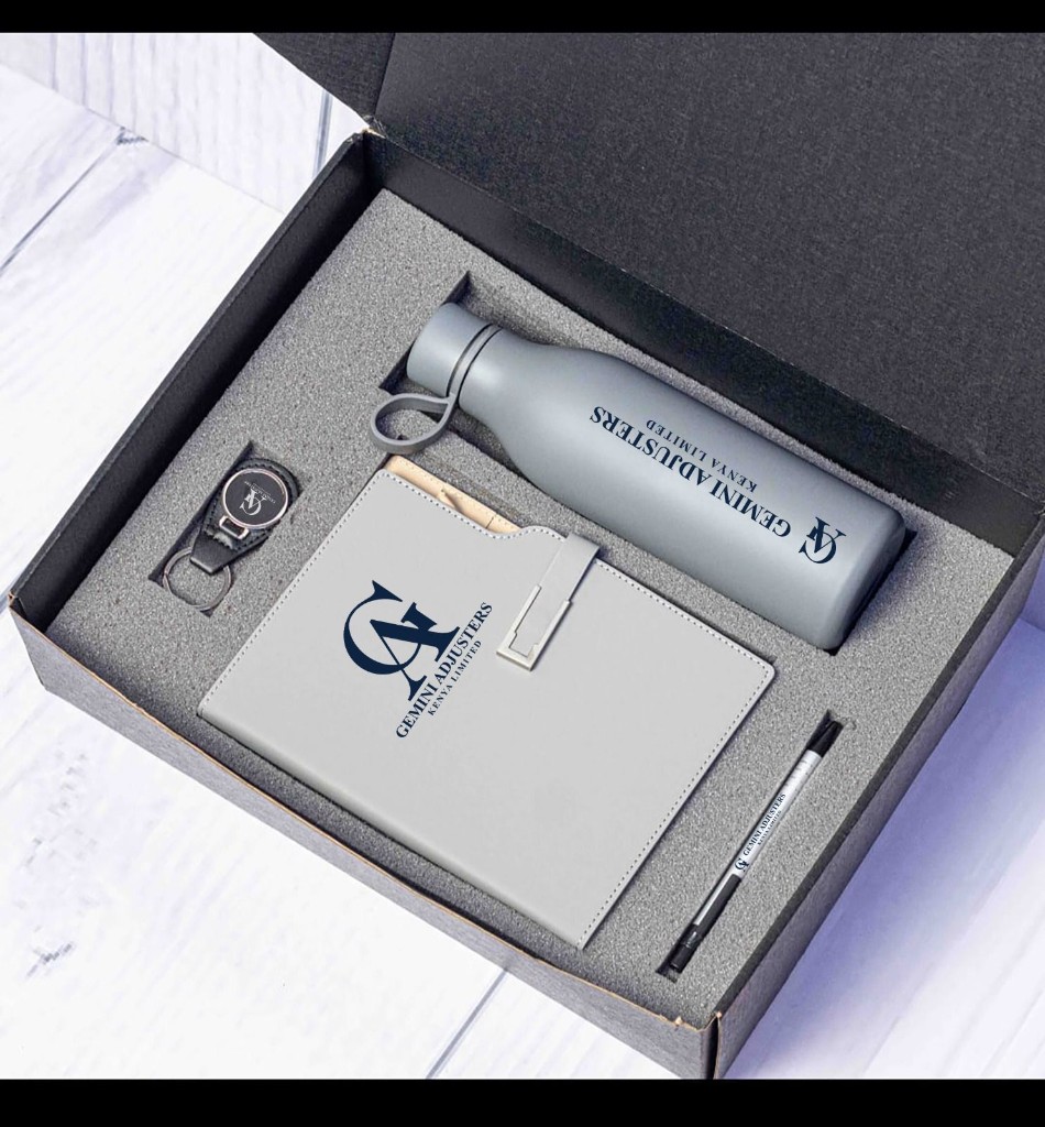 Branded Gemini Adjusters gift set with notebook, bottle, pen and key holder.